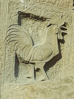 Rooster over the Passion side entry